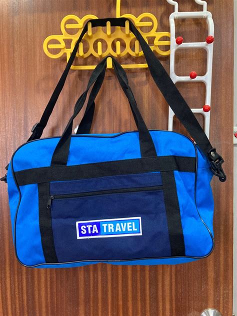 Blue hand carry travel bag by STA Travel, Hobbies & Toys, Travel ...