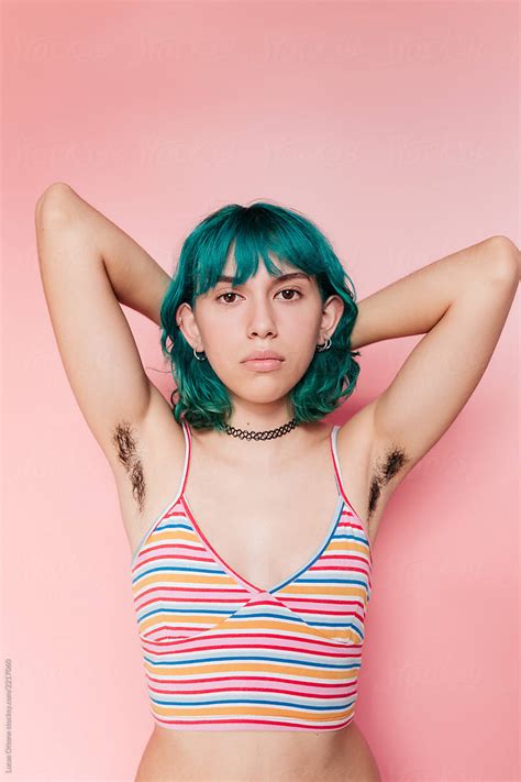 "Natural Teenager With Hairy Armpits" by Stocksy Contributor "Lucas Ottone" - Stocksy
