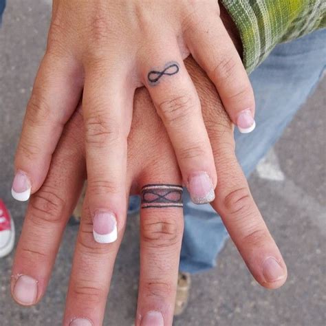 wedding-ring-tattoo+(13) | Ring finger tattoos, Ring tattoo designs ...