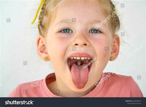 2.005 Child Girl Open Mouth And Tongue Images, Stock Photos & Vectors | Shutterstock