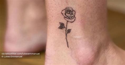 Rose tattoo located on the ankle, illustrative style.