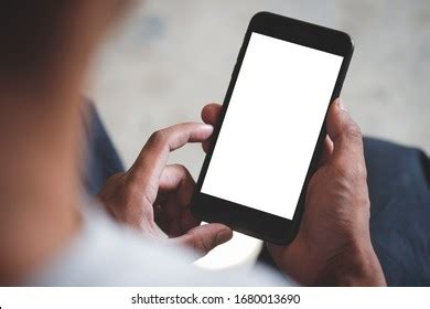 Man Holding iPhone in His Car Free Stock Photo | picjumbo