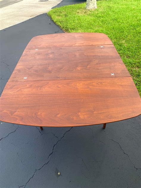 American of Martinsville Walnut Drop Leaf Dining Table by Merton Gershun at 1stDibs