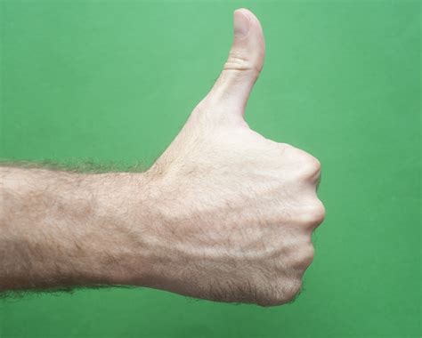 Free Image of Man Hand Showing Thumbs Up Sign | Freebie.Photography