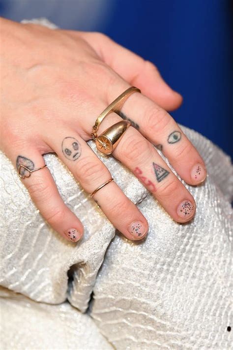 Heart Tattoo On Finger Meaning - Photos Idea