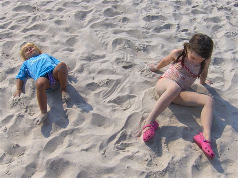 Sand Angels | Maddy teaches Violet how to make sand angels. | Joe ...