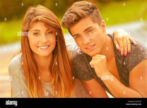 Teenage couple lying down hi-res stock photography and images - Alamy