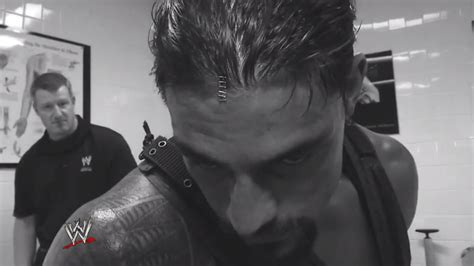 Roman Reigns injured on Raw; watch video of him getting staples put ...