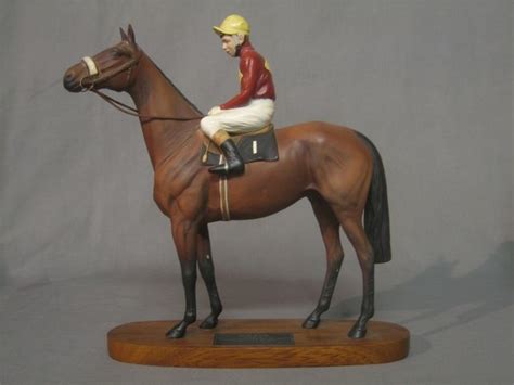 A Beswick figure of Red Rum with Jockey Up, raised on | 20th January ...