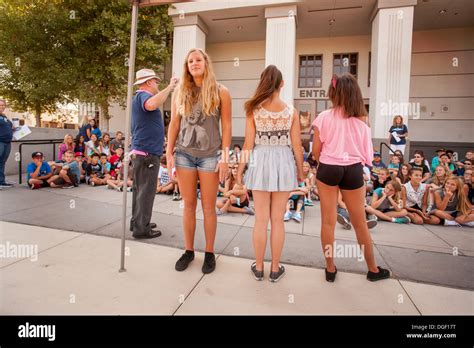 Middle school students model inappropriate clothing as a teacher Stock Photo: 61795884 - Alamy