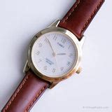 Elegant Vintage Timex Indiglo Watch | Gold-tone Timex Date Watch – Vintage Radar