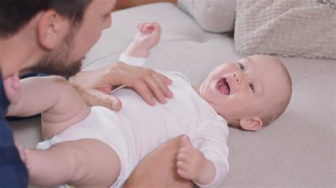 Laughing Baby And Dad Close-Up - Stock Video | Motion Array