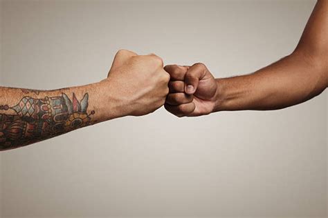 Royalty Free Fist Bump Pictures, Images and Stock Photos - iStock