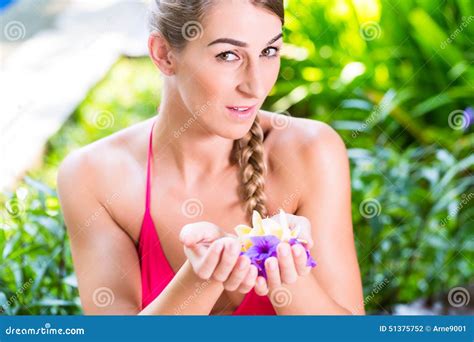 Woman with Flower Petals in Tropical Garden at Pool Stock Photo - Image of asia, wellness: 51375752