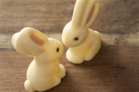 Slanted view of two white chocolate bunnies Creative Commons Stock Image