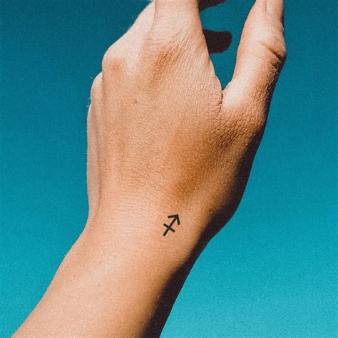 Sagittarius Sign Tattoo For Women