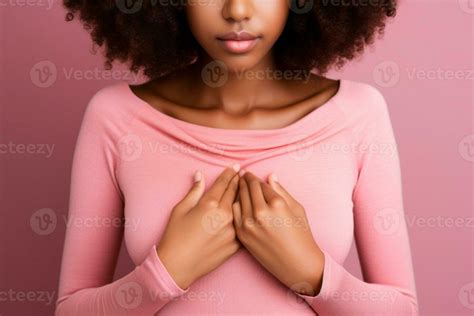 Pink October - Symbolism of solidarity and prevention, woman with pink blouse and alert gesture ...