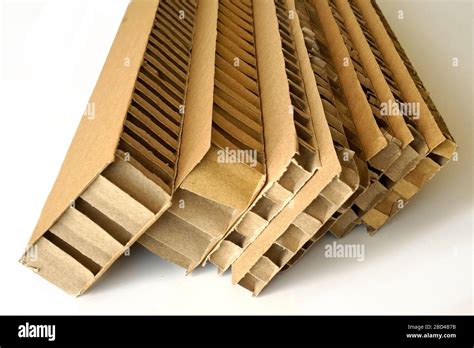 Sheets of brown corrugated cardboard used for filling in fragile ...