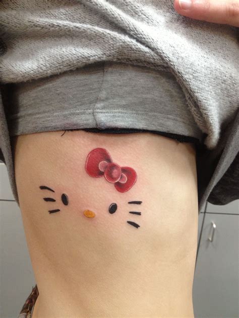 cute hello kitty tattoo (: | Tatuajes de hello kitty, Tatuajes impresionantes, Tatuajes de cara ...