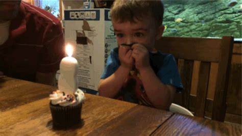 This 2-Year-Old Trying To Blow Out His Birthday Candle Is Heartbreakingly Cute