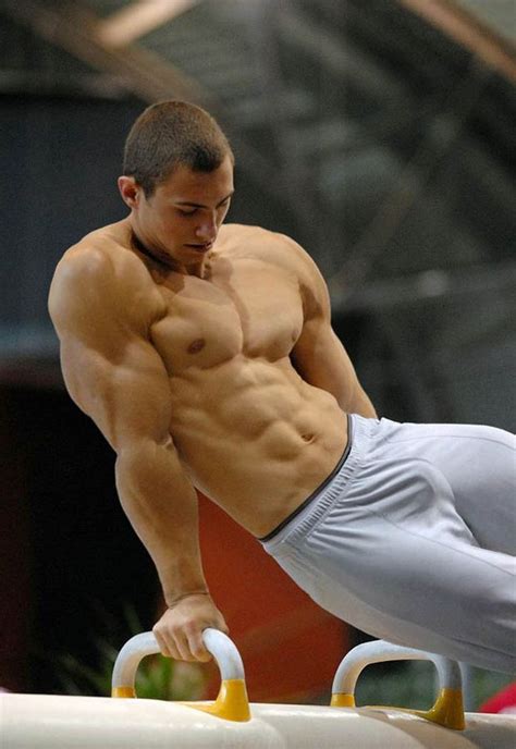 Every gymnast needs incredible arms, BICEPS and an strong core. This delicious man has it all ...