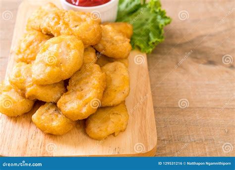 Chicken nuggets with sauce stock photo. Image of food - 129531216