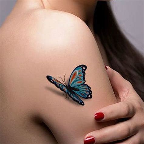 a woman with a butterfly tattoo on her shoulder