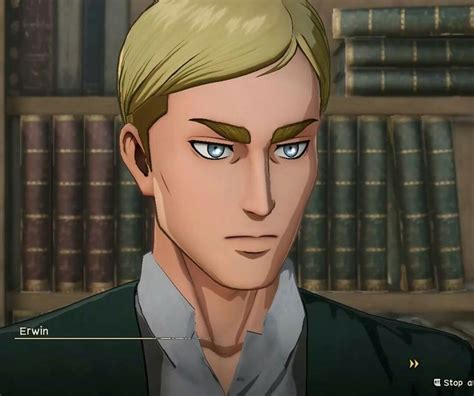 an animated image of a man with blonde hair and blue eyes in front of bookshelves