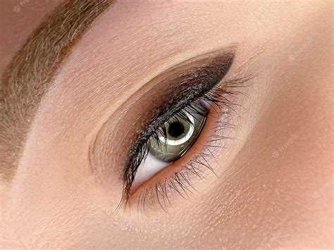 Premium Photo | Performed procedure of permanent makeup of the upper eyelid