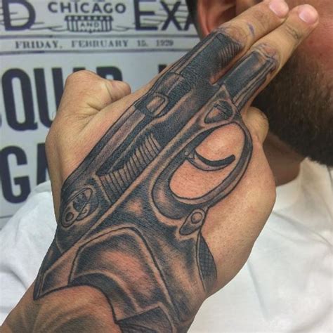 Details more than 74 gun tattoos for men - in.coedo.com.vn