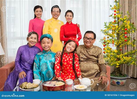 Vietnamese Family in National Costumes Stock Photo - Image of tree, portrait: 50161556