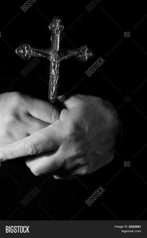 Praying Hands Holding Cross Image & Photo | Bigstock