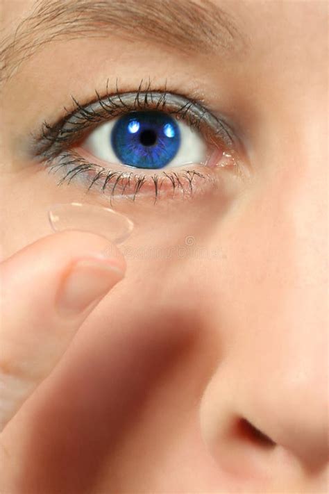 Blue eye contact lens stock photo. Image of cheek, pupil - 3134834