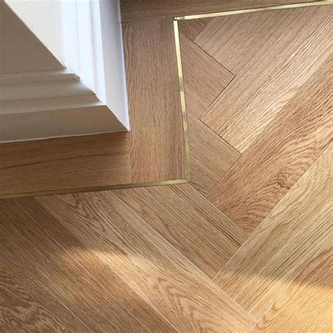 Design Emporium on Instagram: "Brass inlay forms a border in this ...