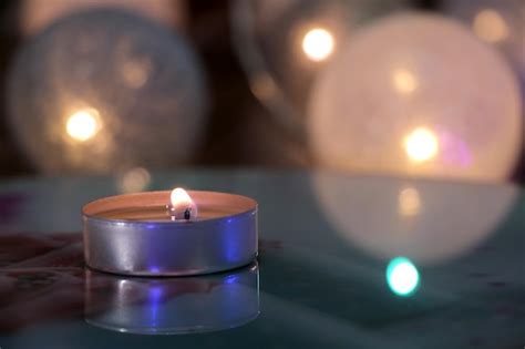 Premium Photo | Candle on a bright background romantic evening