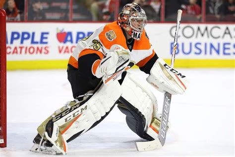 PHILADELPHIA, PA - DECEMBER 21: Goalie Steve Mason #35 of the Philadelphia Flyers tends the net ...