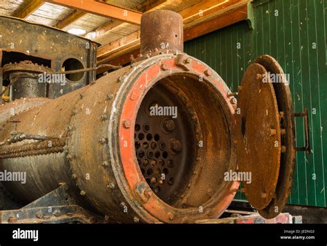 Looking inside and old steam engine train boiler Stock Photo - Alamy