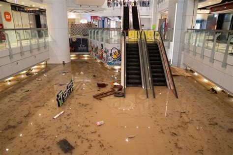 Hong Kong swamped by record rain flooding roads and subway stations