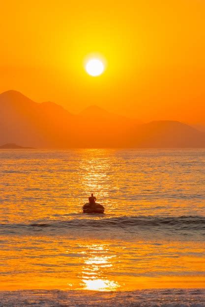 Premium Photo | Sunrise on copacabana beach in rio de janeiro brazil.