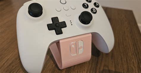 Nintendo Switch controller stand with logo by Joost | Download free STL model | Printables.com