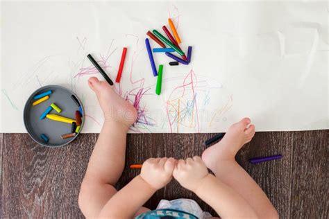 The Child Learns To Draw Wax Crayons, Sits on the Floor Stock Photo - Image of concept, paint ...