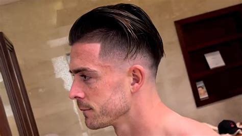 Topless Jack Grealish shows off new haircut ahead of England's World Cup quarter-final against ...