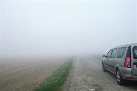 Car Driving Through Fog Photograph by Jmquinet/reporters/science Photo Library | Fine Art America