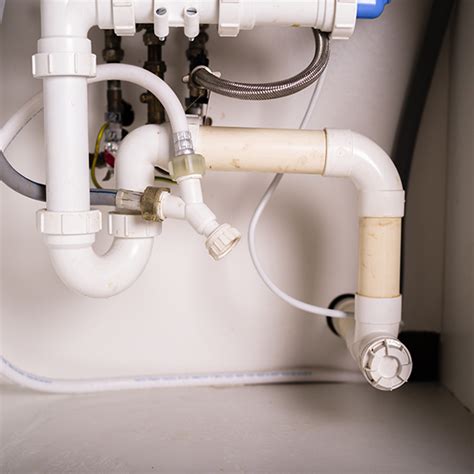 Below the Kitchen Sink: Dealing With Kitchen Drain Pipe Leaks - Water Extraction Experts