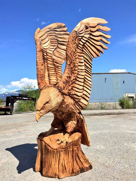 Woodcarved eagle. | Wood carving art, Chainsaw carving, Chainsaw wood ...