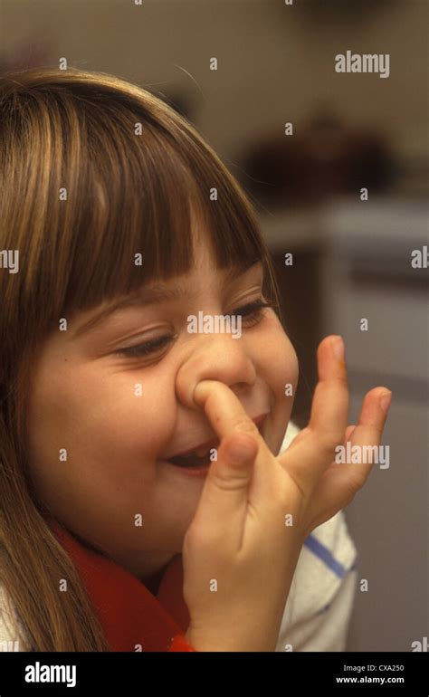 little girl picking her nose Stock Photo - Alamy