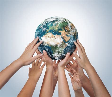 Many Children Hands Holding Planet Earth Isolated on Blue Background ...