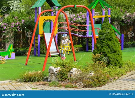 Little Children Run Around and Play in the Playground. Game Cent Stock ...