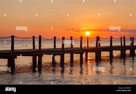 ocean pier during sunset Stock Photo - Alamy