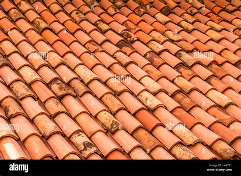 Red roof shingles. Italy Stock Photo - Alamy